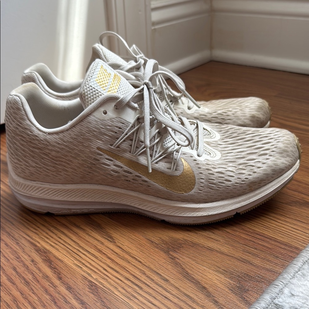 Nike Gold and Cream Athletic Shoes Sleek Design